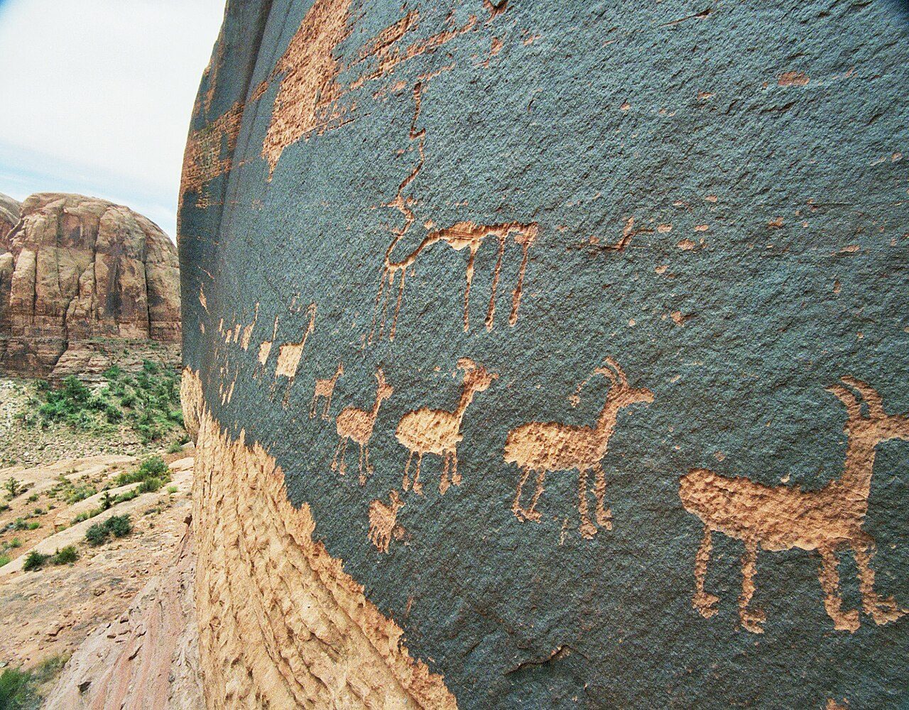 A petroglyph of a caravan of bighorn sheep near Moab, Utah , USA; a common theme in glyphs from the desert southwest.