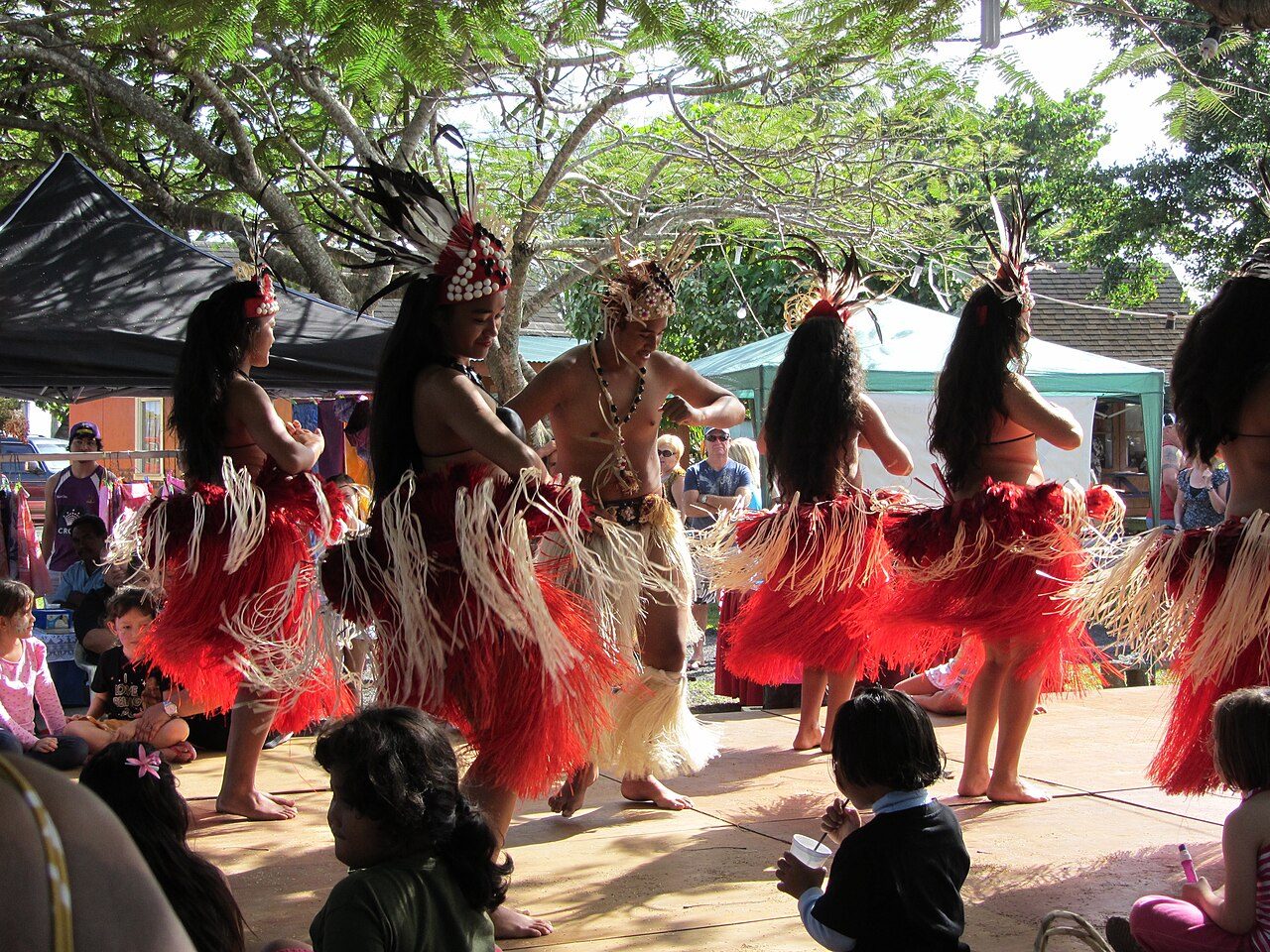 Performing traditional dance at Punanga Nui Market.