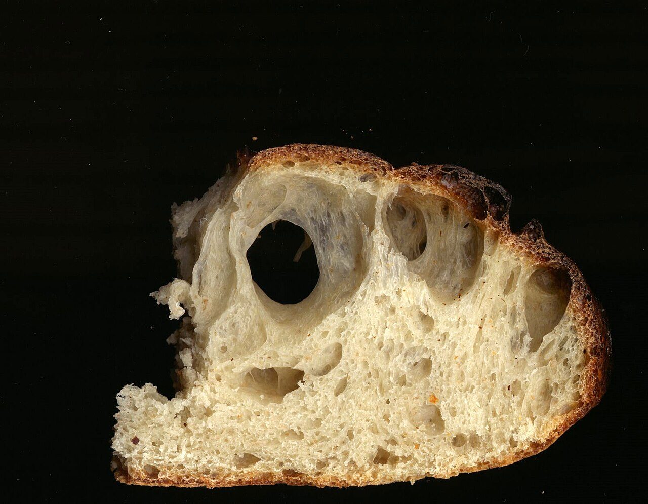 Slice of sourdough bread .