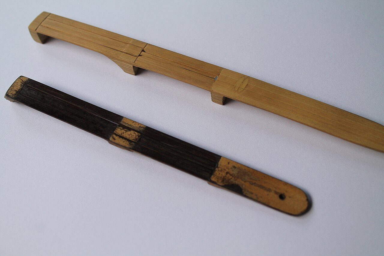 Two karindings of West Java, Indonesia. long: made of bamboo, short: made of palm midrib.