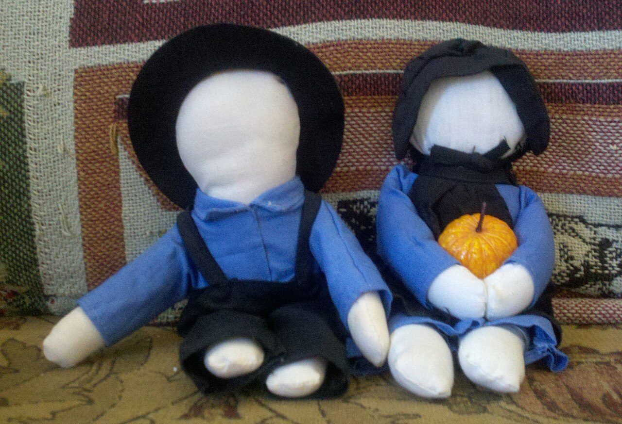 A photo of Amish faceless dolls