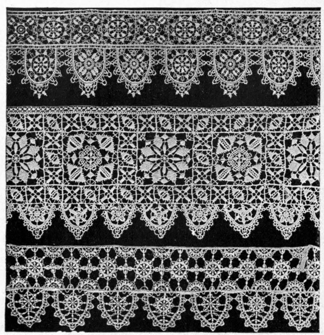 Fig. 3.--THREE VANDYKE OR DENTATED BORDERS OF ITALIAN LACE OF THE LATE 16th CENTURY. Style usually called "Reticella" on account of the patterns being based on repeated squares or reticulations. The two first borders are of needlepoint work; the lower border is of such pillow…