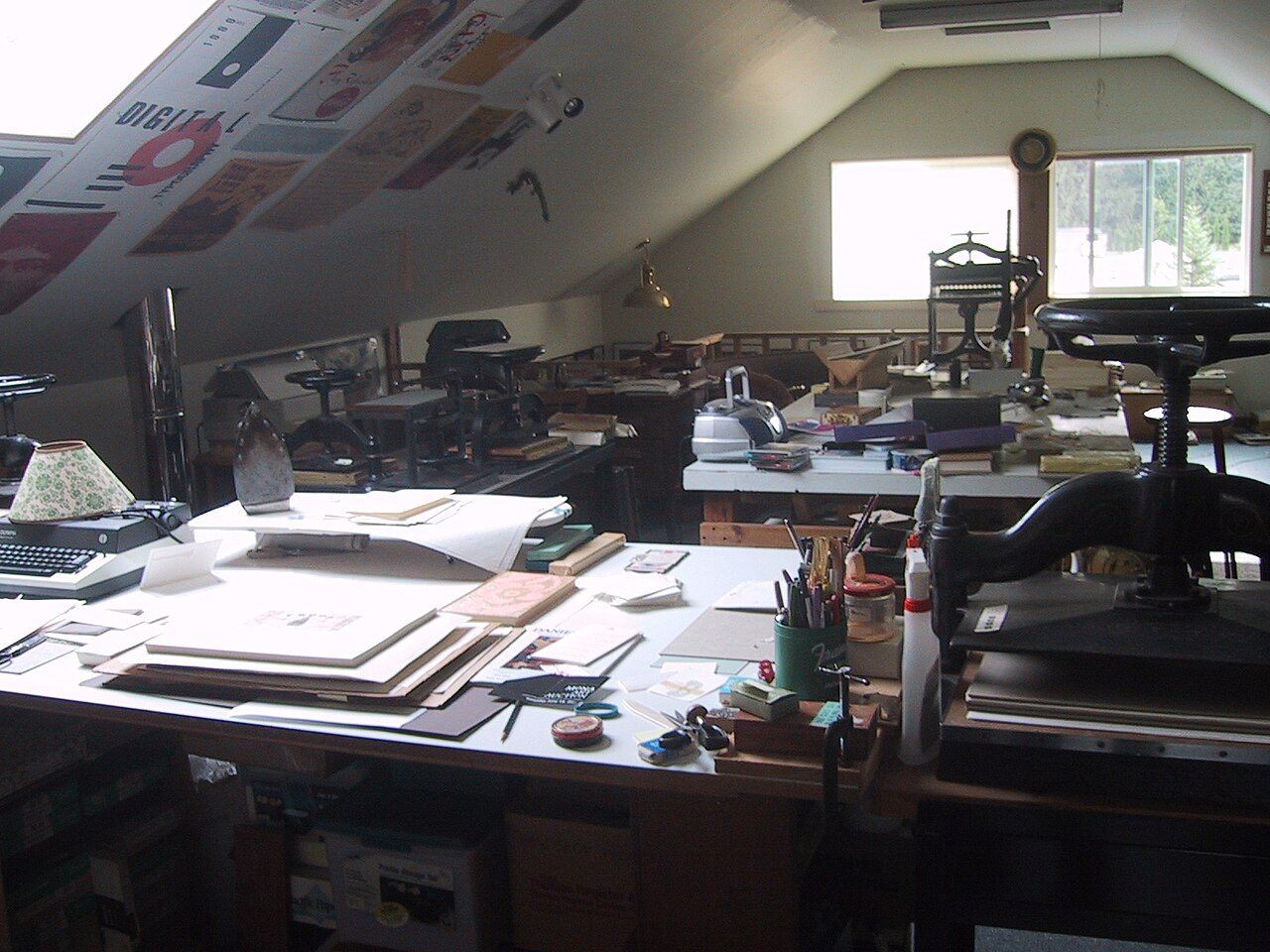 Bookbindery Photographs taken by Christopher Chen, showing creating a Cree typeface on hot metal Monotype machinery.