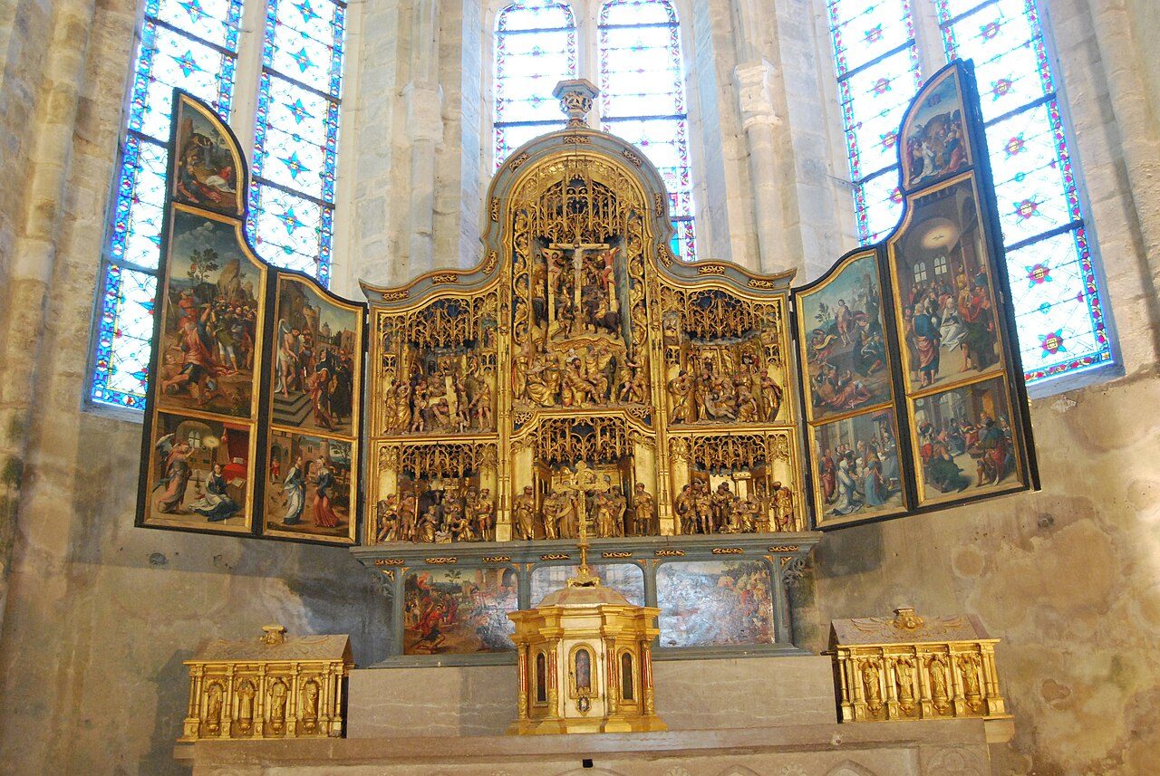 Retable anversois dans le chœur de l'église abbatiale de Baume-les-Messieurs.
