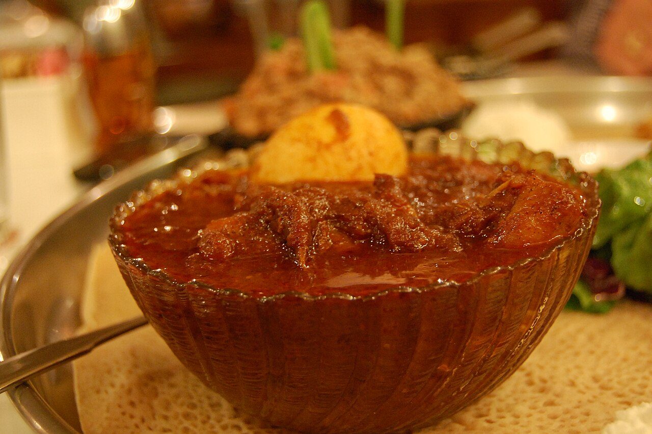 Wat or wet, known as tsebhi in Tigrinya (also wot; Amharic ወጥ weṭ, Tigrinya ጸብሒ ṣebḥī) is an Eritrean and Ethiopian stew which may be prepared with chicken, beef, lamb, a variety of vegetables, and spice mixtures such as berbere and niter kibbeh, a seasoned clarified butter.