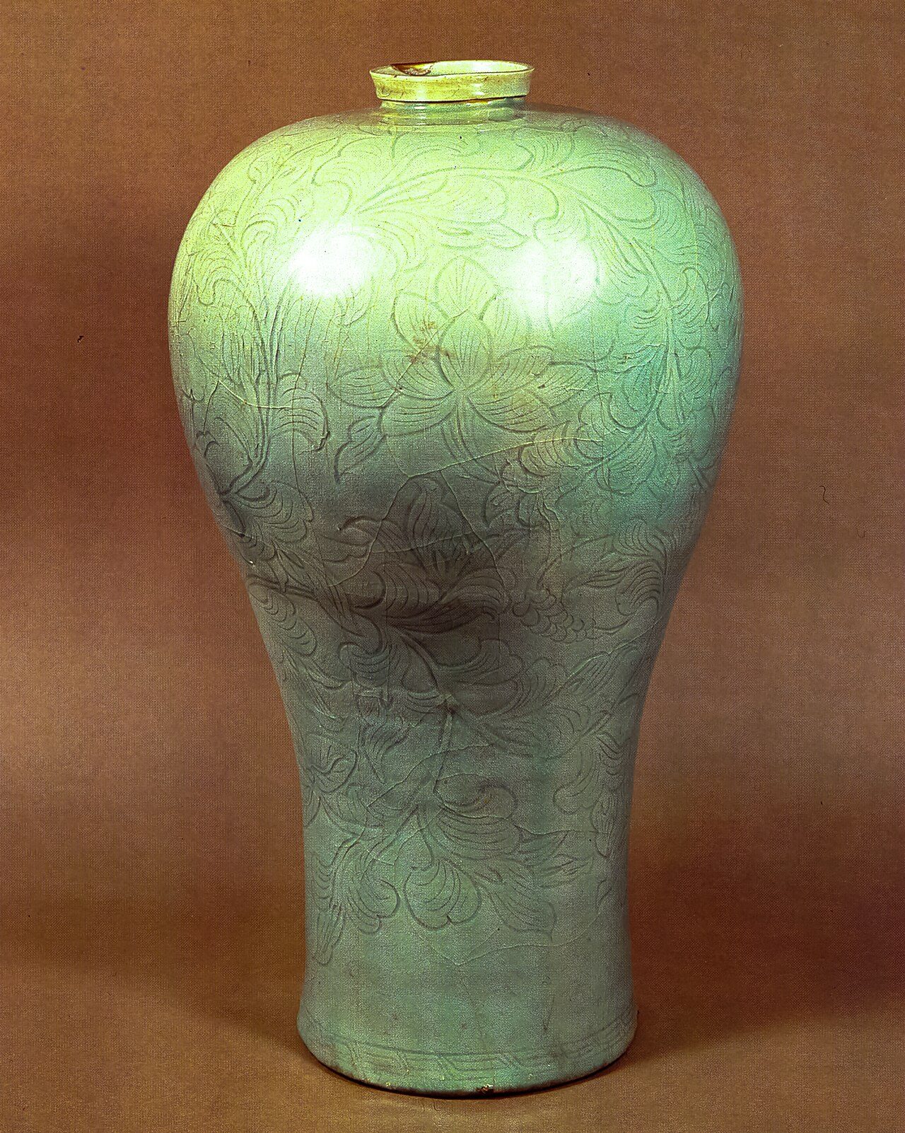 Celadon Prunus Vase with Incised Lotus and Arabesque Design