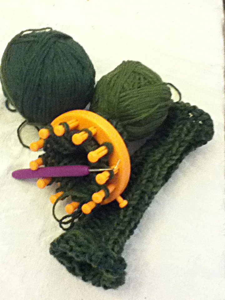 Fingerless gloves knit on a Provo Craft 12-peg "flower loom."