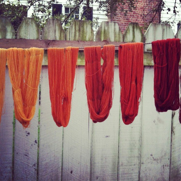 Skeins dyed naturally with madder root, hanging to dry, at Colonial Williamsburg, Virginia, USA. 3/31/12