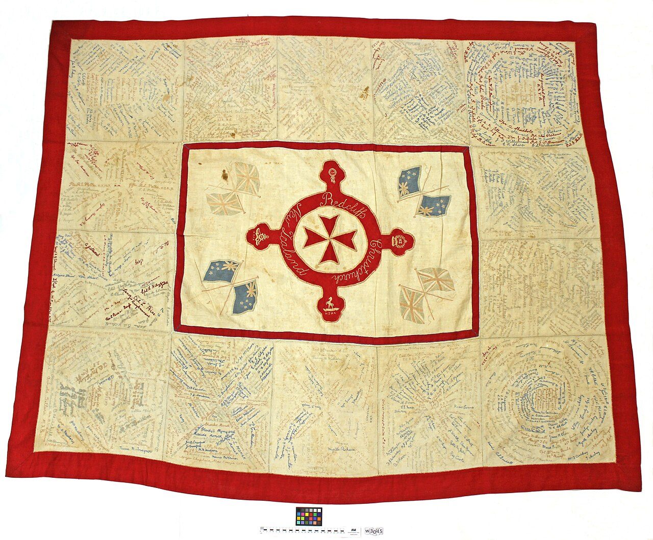 Embroidered fundraising signature quilt made by Red Cross and St. Johns, Redcliffs, near Christchurch, WW1, includes signature of Lieut. Gilbert Archey, New Zealand Field Artillery, who later became Director of Auckland War Memorial Museum. unlined cloth; central rectangle with…