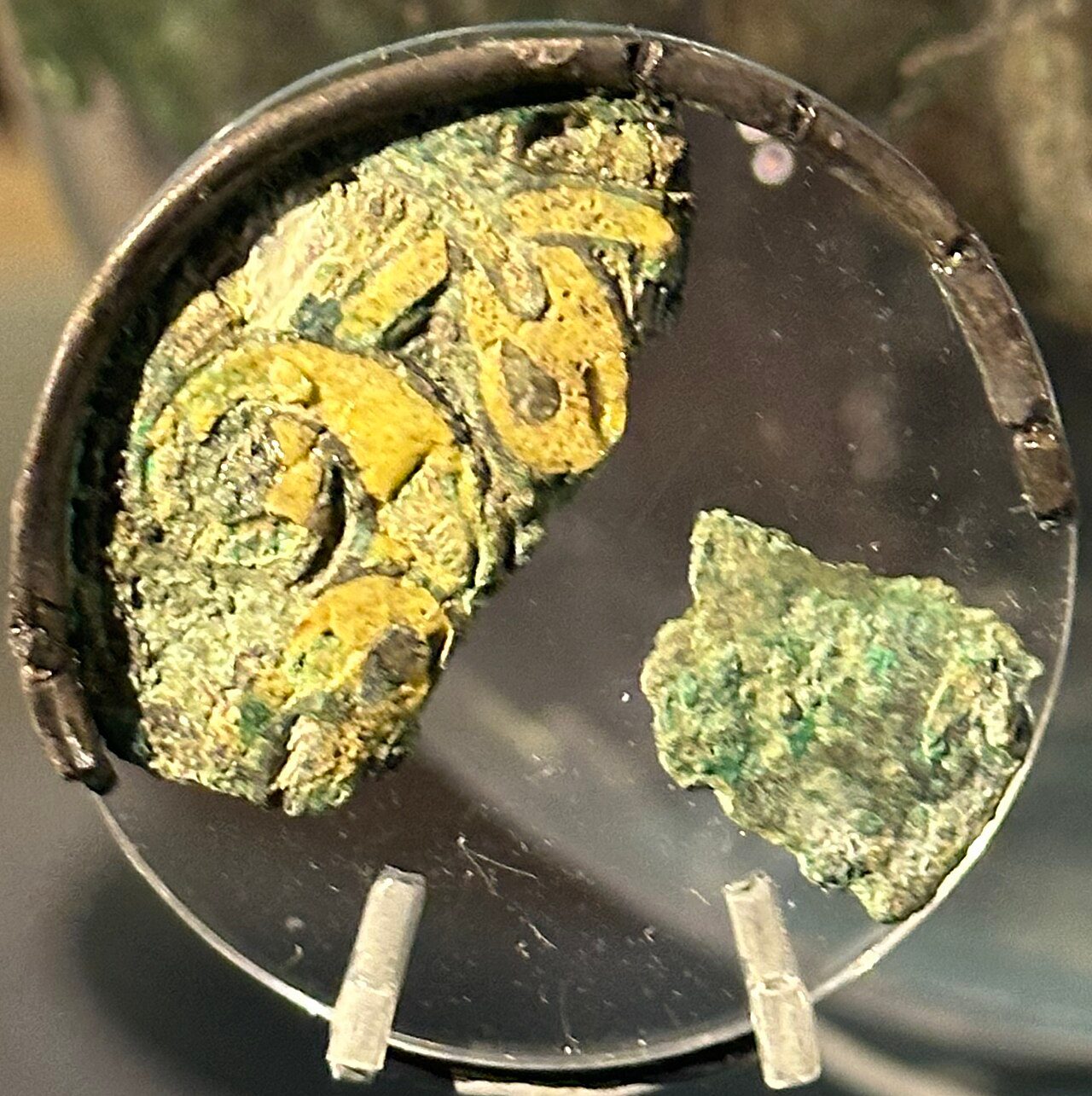 Escutcheon from the Benty Grange hanging bowl, located at the Weston Park Museum in Sheffield