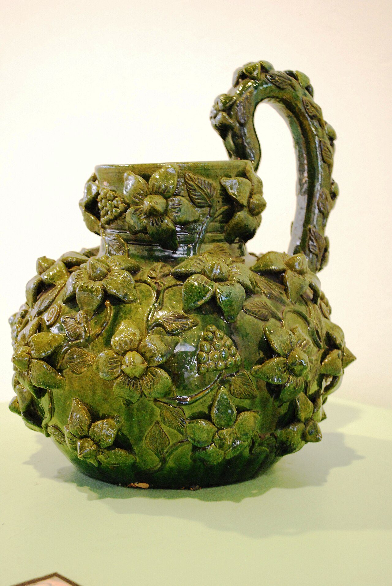 Green glazed ceramic jar by unknown artisan from Santa María Atzompa at the Museo Estatal de Arte Popular de Oaxaca in San Bartolo Coyotepec, Oaxaca, Mexico