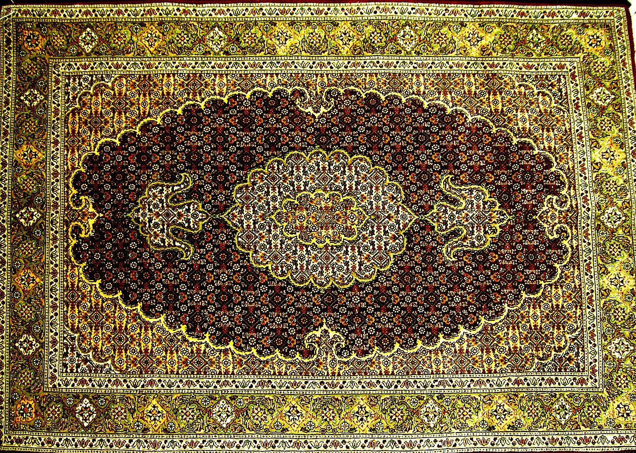 Rug from Tabriz, Iran. made of wool and silk. "fish design"