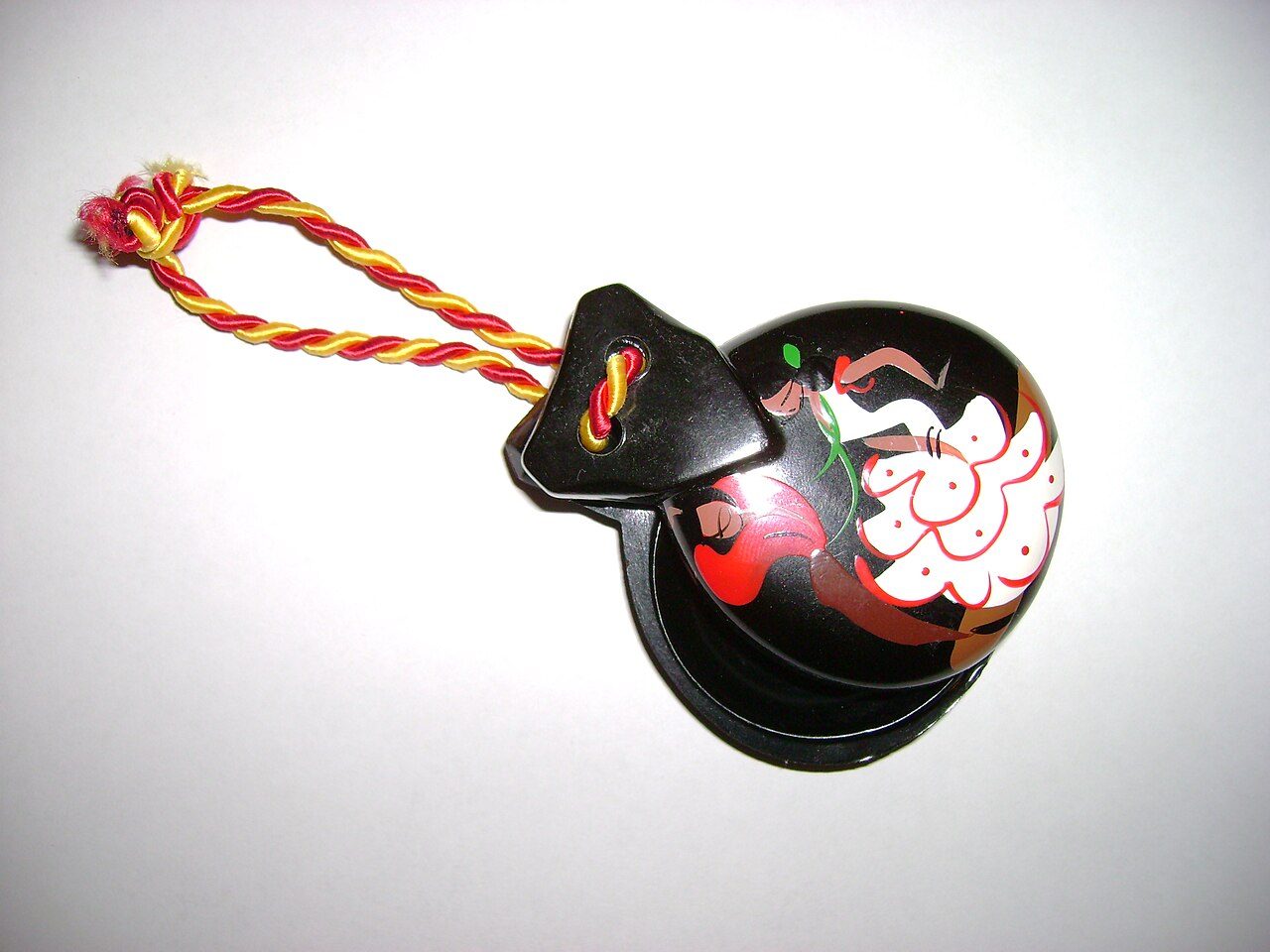Castanets , Spanish popular percussion instrument.