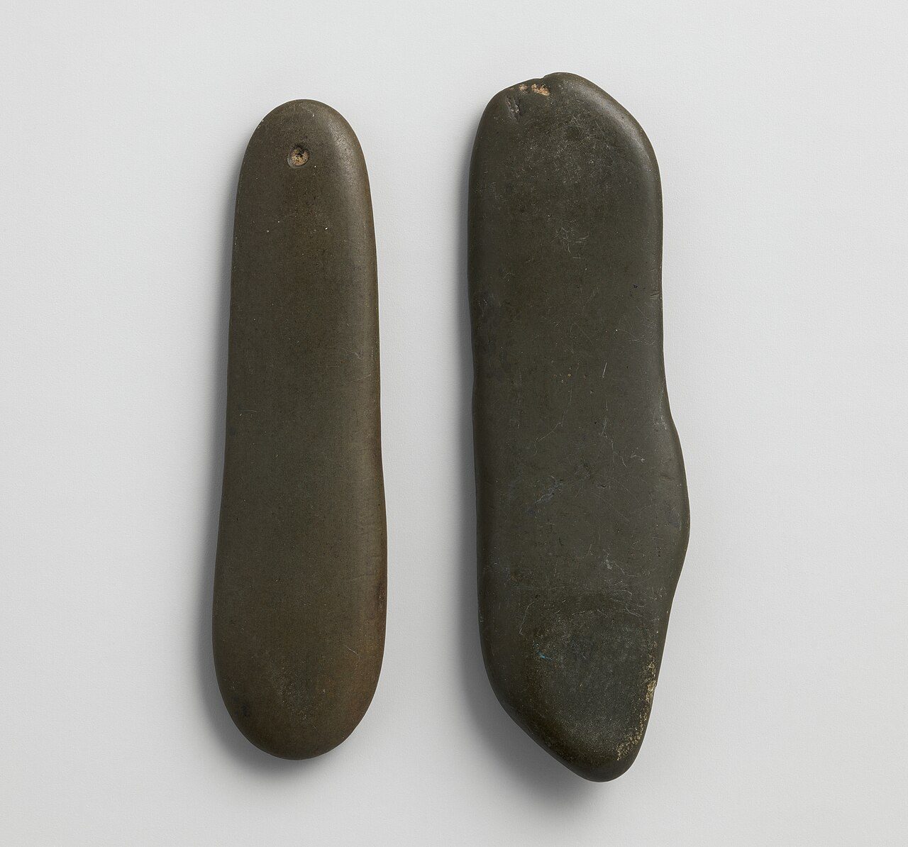 Qairaq or kairak (stone castanets) mid-20th century. From the collection of the Metropolitan Museum of Art, placed in the public domain on the item's web page: https://www.metmuseum.org/art/collection/search/690655 From the museum: "Artwork Details Title: Qairaq (stone…