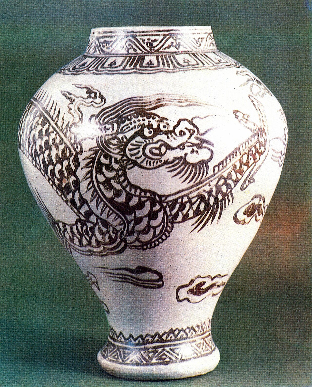White Porcelain Jar with Underglaze Iron Cloud and Dragon Design