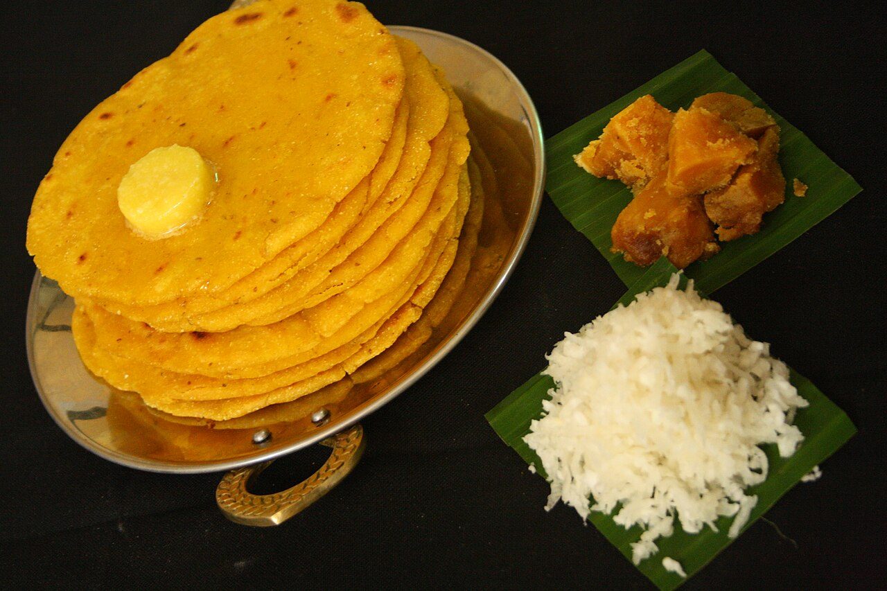 (Makki di roti is a Punjabi corn meal bread which is typically eaten with Sarson ka Saag in Chitpreet’s home.) Yield: 8 rotis Makki ka atta (Corn meal flour) 400 grams Water 200 millilitres Ajwain 5 grams Oil 15 millilitres Salt 5 grams Ghee 40 millilitres Method: • Form a stiff…