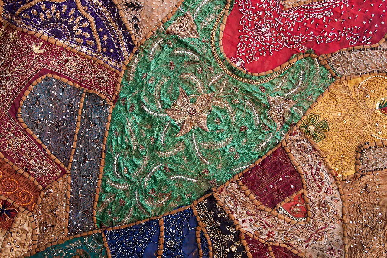 Colorful fabric artwork, ornamental patterns on textile. Jew Town in Old Cochin. Kochi, Kerala, India.