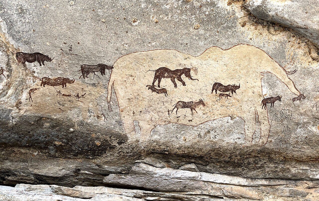 Prehistoric rock art site in northeast Zimbabwe showing a variety of large animals that were symbolic of the hunter-gather world view. Includes elephant, rhino. They relate to they complex system of trance or myth, both essential elements of their socio-religious system.