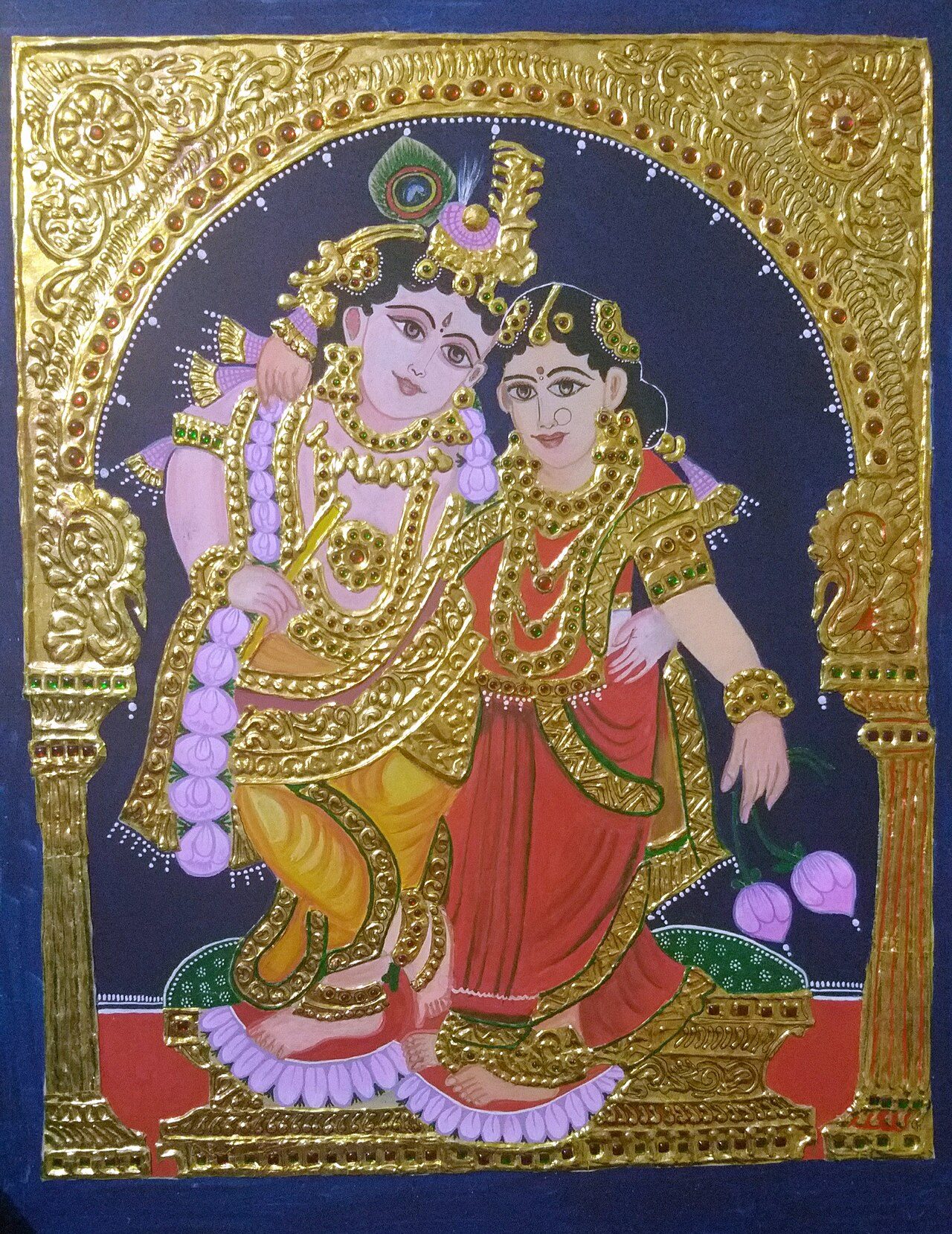 This is thanjavur art originated from southern India. It is generally made using 24 carrot gold.