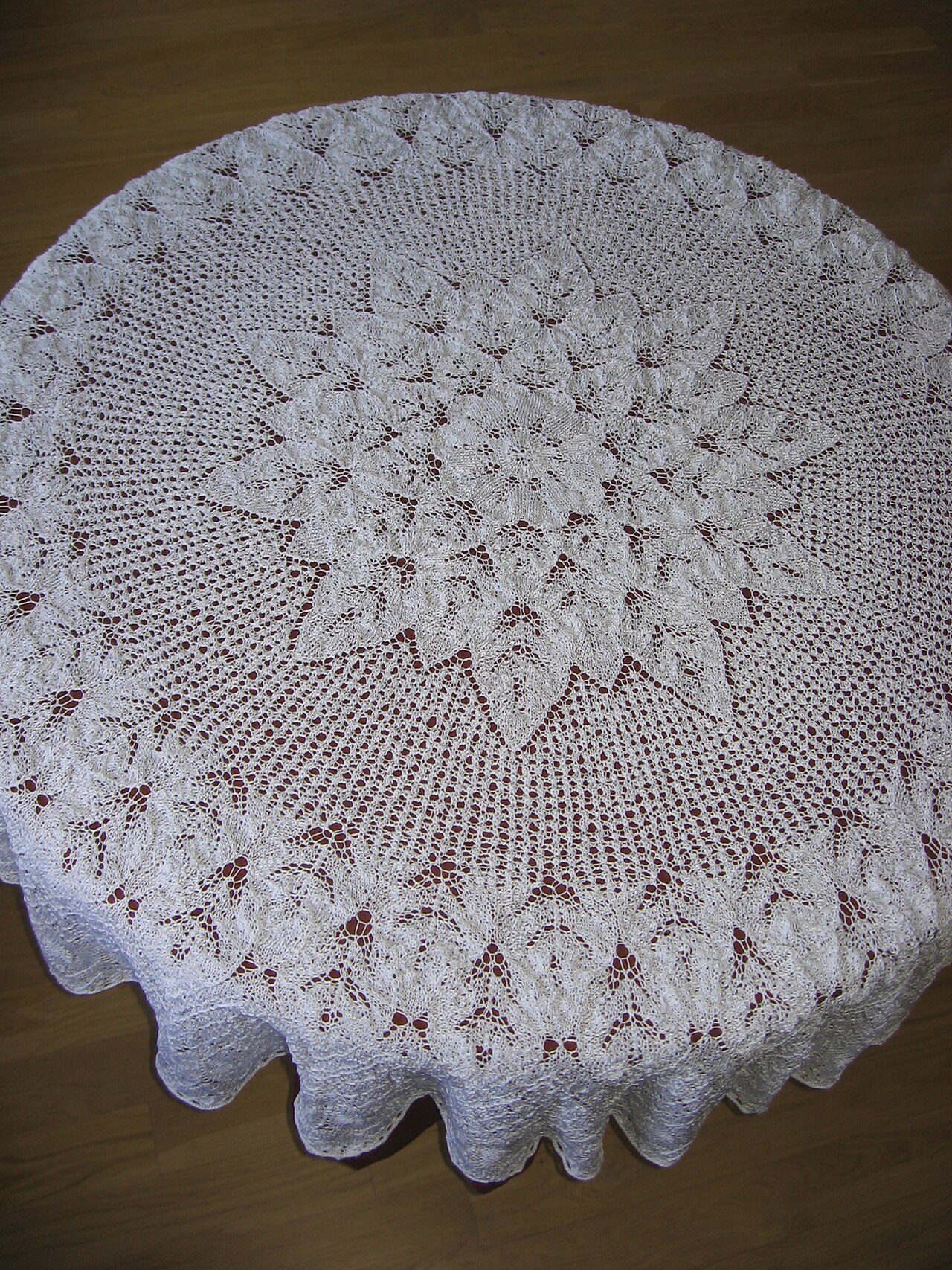 lace tablecloth made using knitting needles