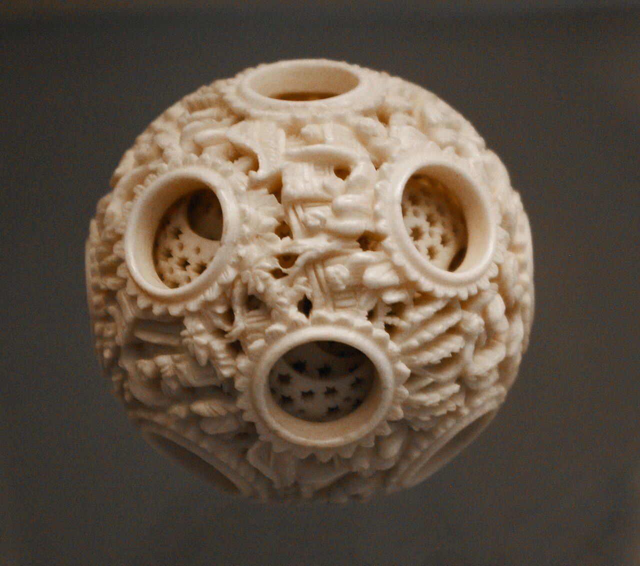 Twelve concentric balls nestled inside each other