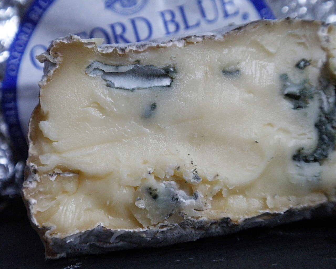 Oxford Blue Moist and creamy with a delightful tang from the blue veining leaving an aromatic and spicy aftertaste in the mouth. Oxford Blue Cheese is the brainchild and product of Baron Robert Pouget of the Oxford Cheese Company. It is produced for him by Hartington Dairy and…