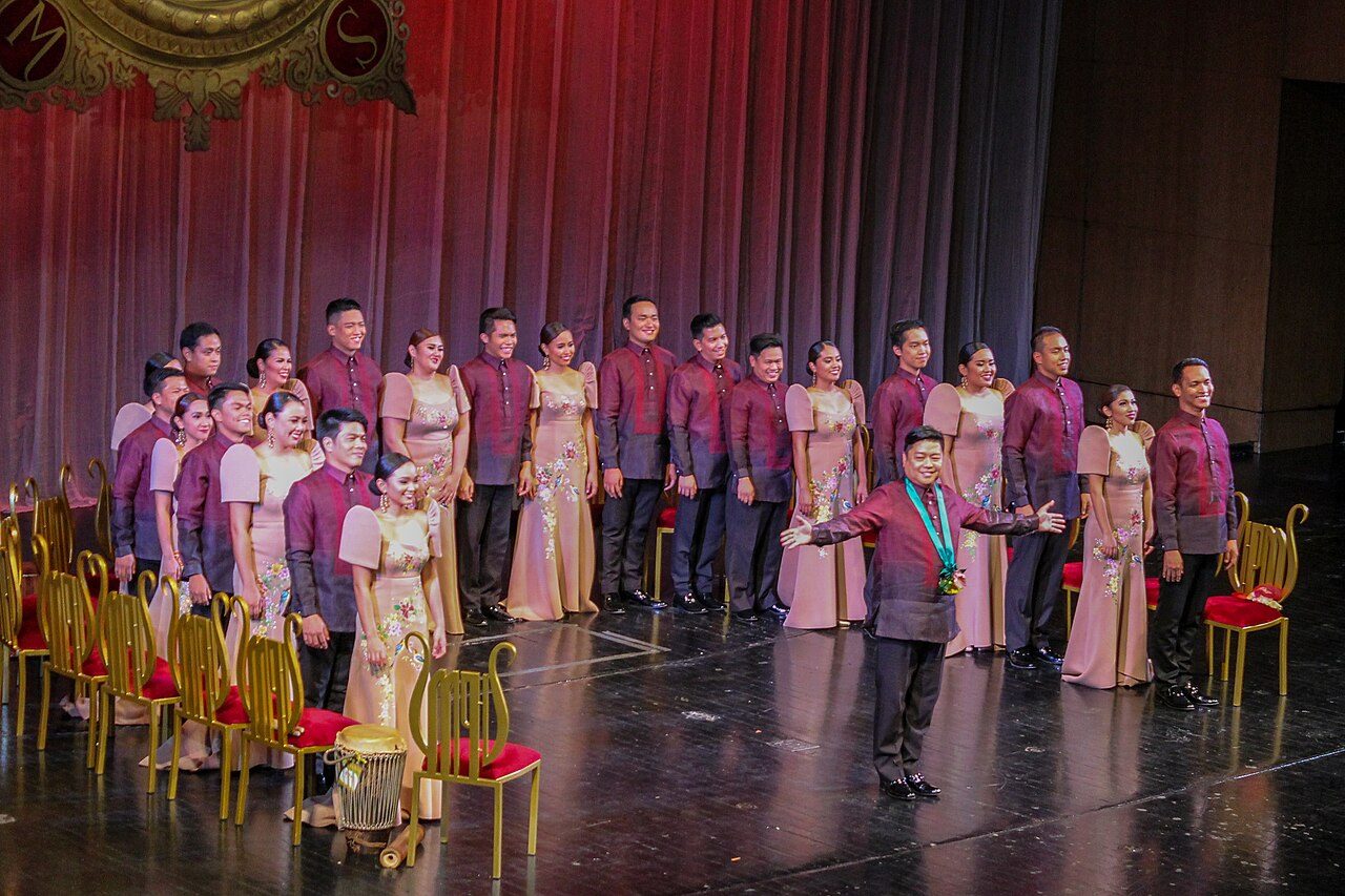 The Philippine Madrigal Singers acknowledges the audience at the end of their concert "Trionfo" (8 October 2016) at the Main Theater (Tanghalang Nicanor Abelardo of the Cultural Center of the Philippines. The concert was held to celebrate their victory at the Guidoneum (Guido…