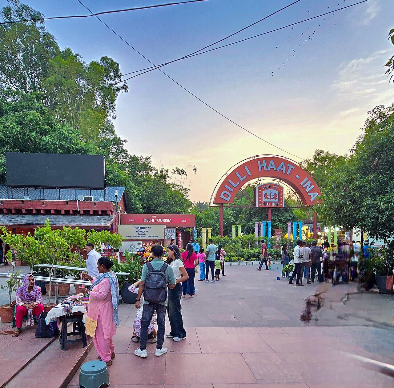 Dilli Haat is a paid entrance open air market in Delhi run by Delhi Tourism and Transportation Development Corporation.