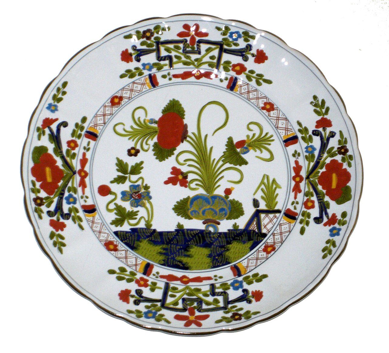 Ceramics (Majolica) plate from the Italian city of Faenza decorated with the style of the "Garofano" (carnation).