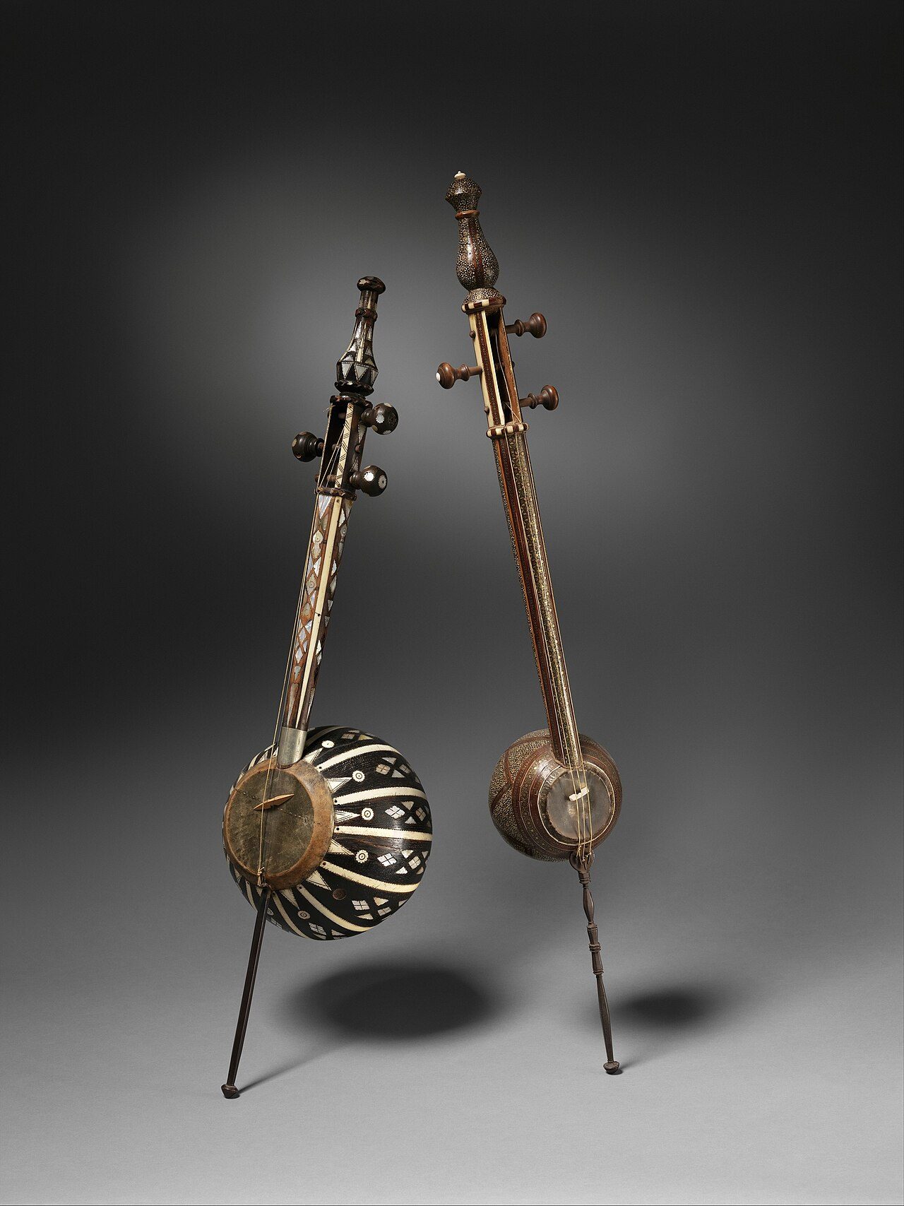 2 Kamānches, Persia, ca. 1880 At the Metropolitan Museum of Art: "Title: Kamānche Date: ca. 1880 Geography: Tehran, Iran (Persia) Culture: Iranian (Persian) Medium: Wood, metal, bone, gut Dimensions: Height: 40 1/2 in. (102.9 cm) Width: 6 in. (15.3 cm) Diameter: 5 1/2 in. (14…