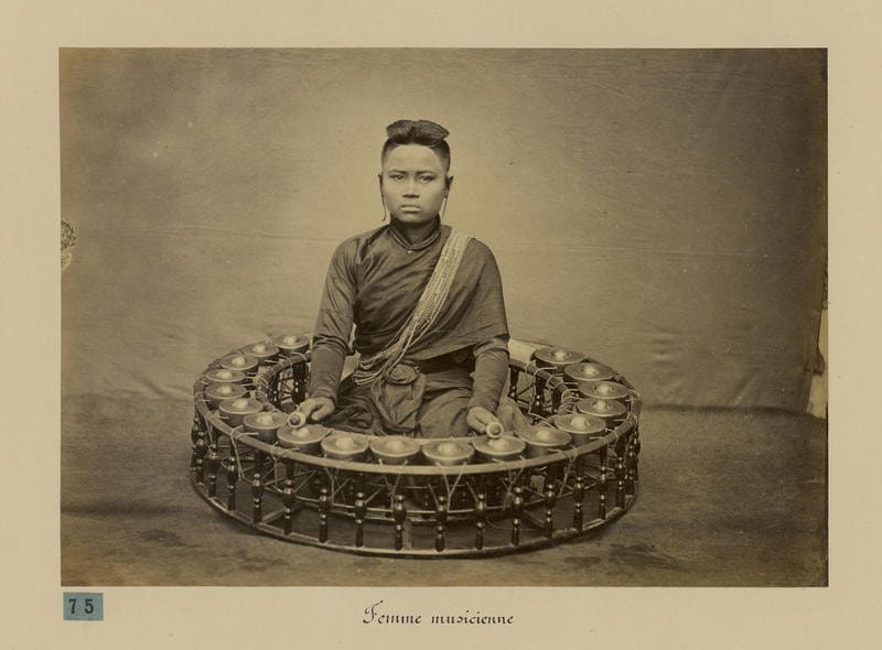 A girl musician with a Kong vong toch taken in mid 1800s by Emile Gsell