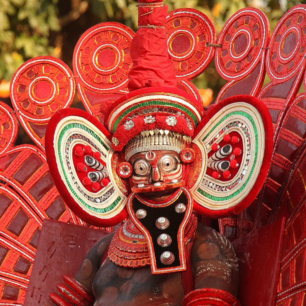 Kuttichathan theyyam performed in a temple in Wayanad, Kerala