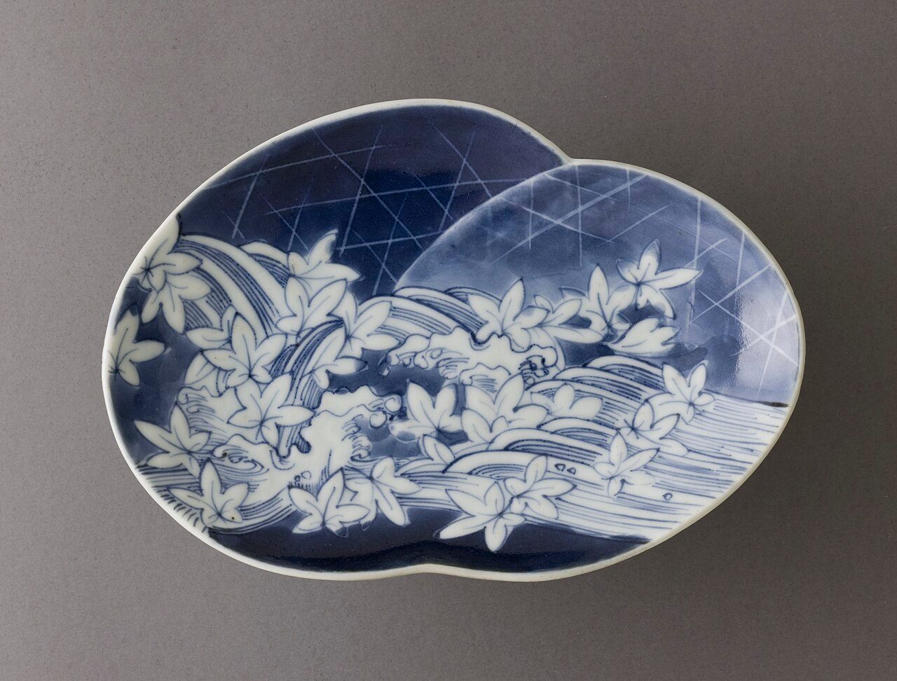Japan, circa 1650s-1670s Furnishings; Serviceware Arita ware; porcelain with underglaze blue 1 1/16 x 6 1/4 x 4 3/8 in. (2.7 x 15.88 x 11.11 cm) Japanese Art Acquisition Fund (M.2007.175) Japanese Art