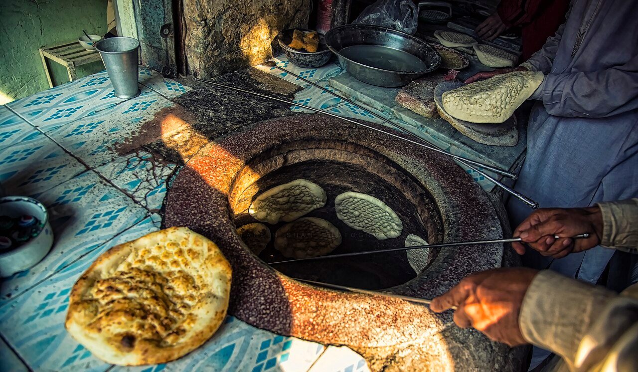 A tandoor also known as tannour is a cylindrical clay or metal oven used in cooking and baking. The tandoor is used for cooking in Southern, Central, and Western Asia, as well as in the South Caucasus. The heat for a tandoor was traditionally generated by a charcoal or wood…