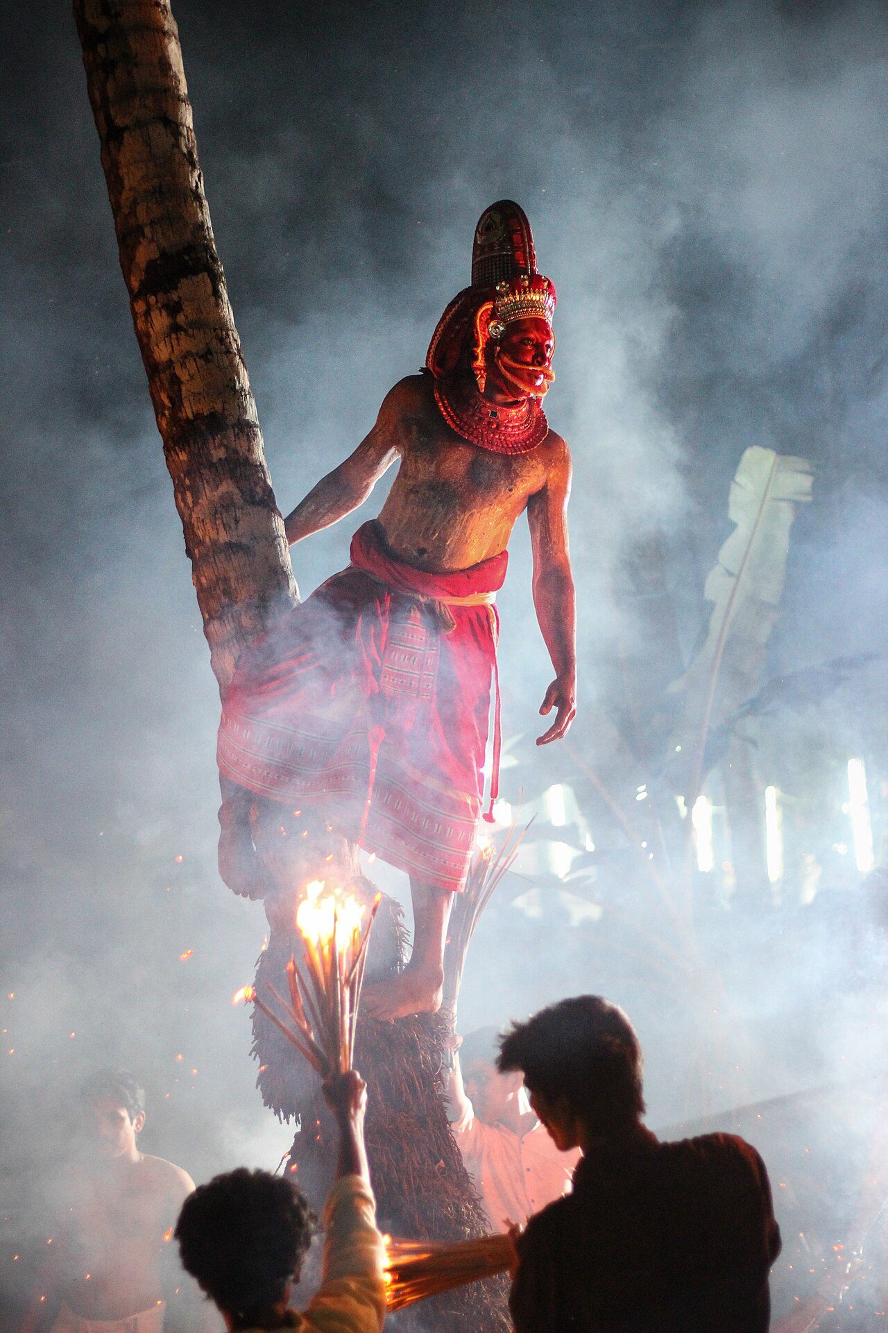 Bappiriyan Theyyam will climb coconut tree. This one the rare theyyams