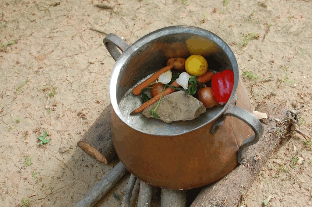 A stone soup is prepared by starting with a mere stone, adding more ingredients, and finally removing the stone