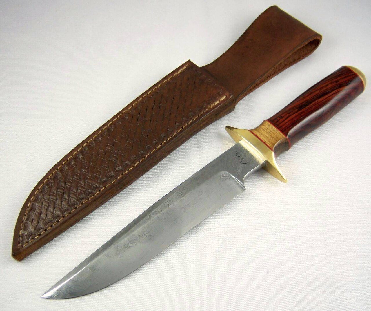 A Carter Cutlery damascus Bowie style blade