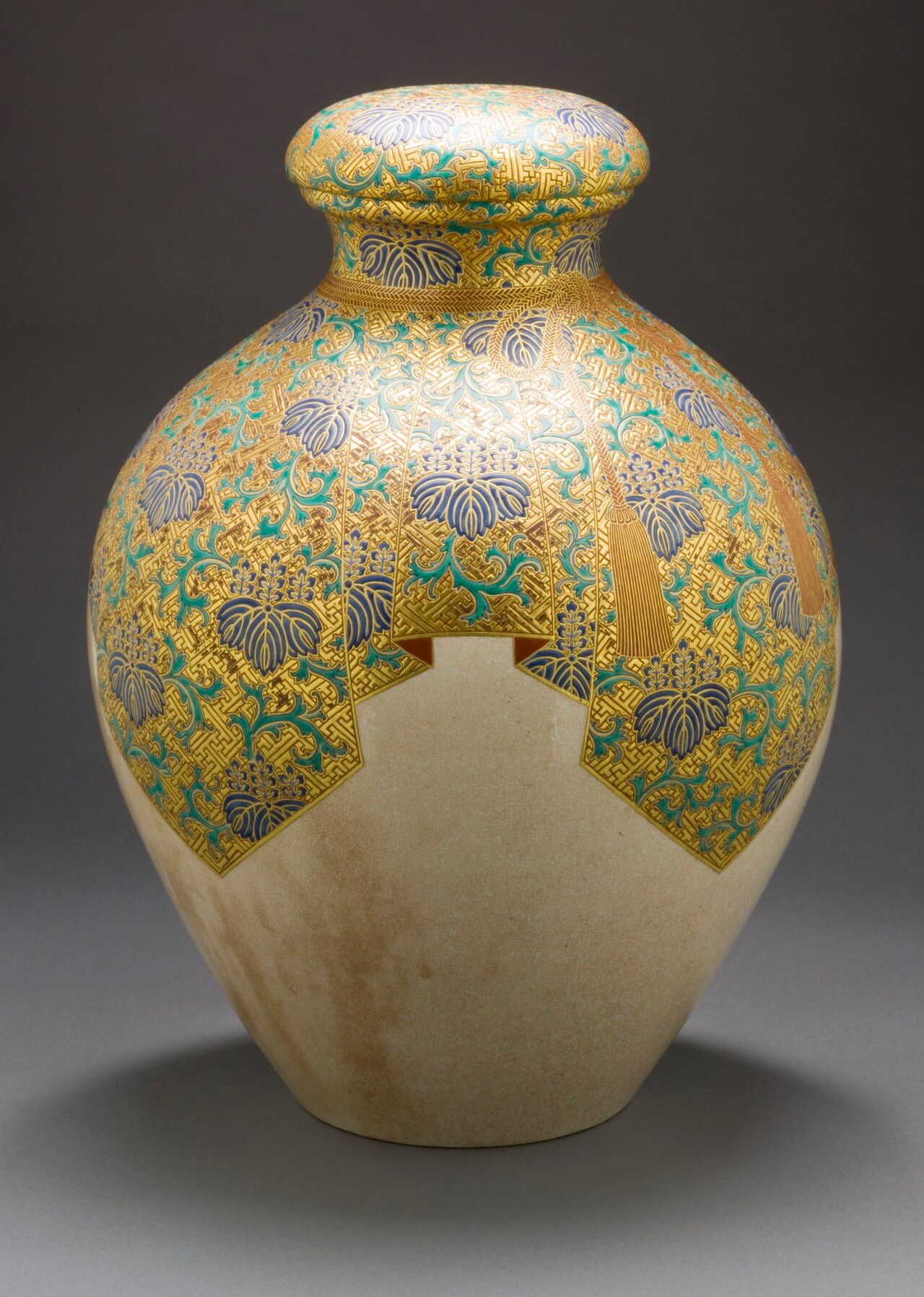 Japan, late Edo period (1615-1868), circa 1800-1850 Furnishings; Serviceware Satsuma ware; earthenware with overglaze enamels and gold a) Lid height: 2 1/8 in. (5.4 cm); a) Lid diameter: 6 in. (15.24 cm); b) Vase height: 14 3/4 in. (37.47 cm); b) Vase diameter: 13 in. (33.02…