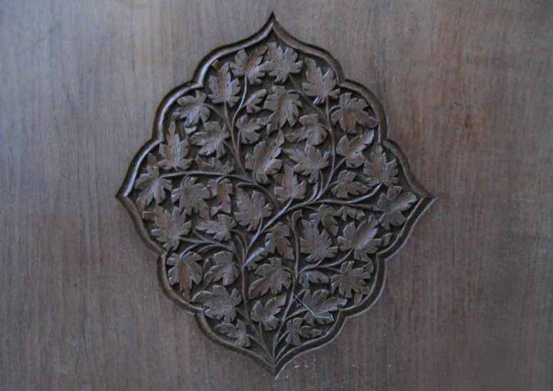 Walnut wood carving on the wall