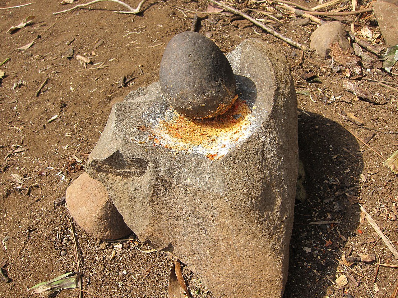 Mitmita being made in mortar and pestle - SW Ethiopia