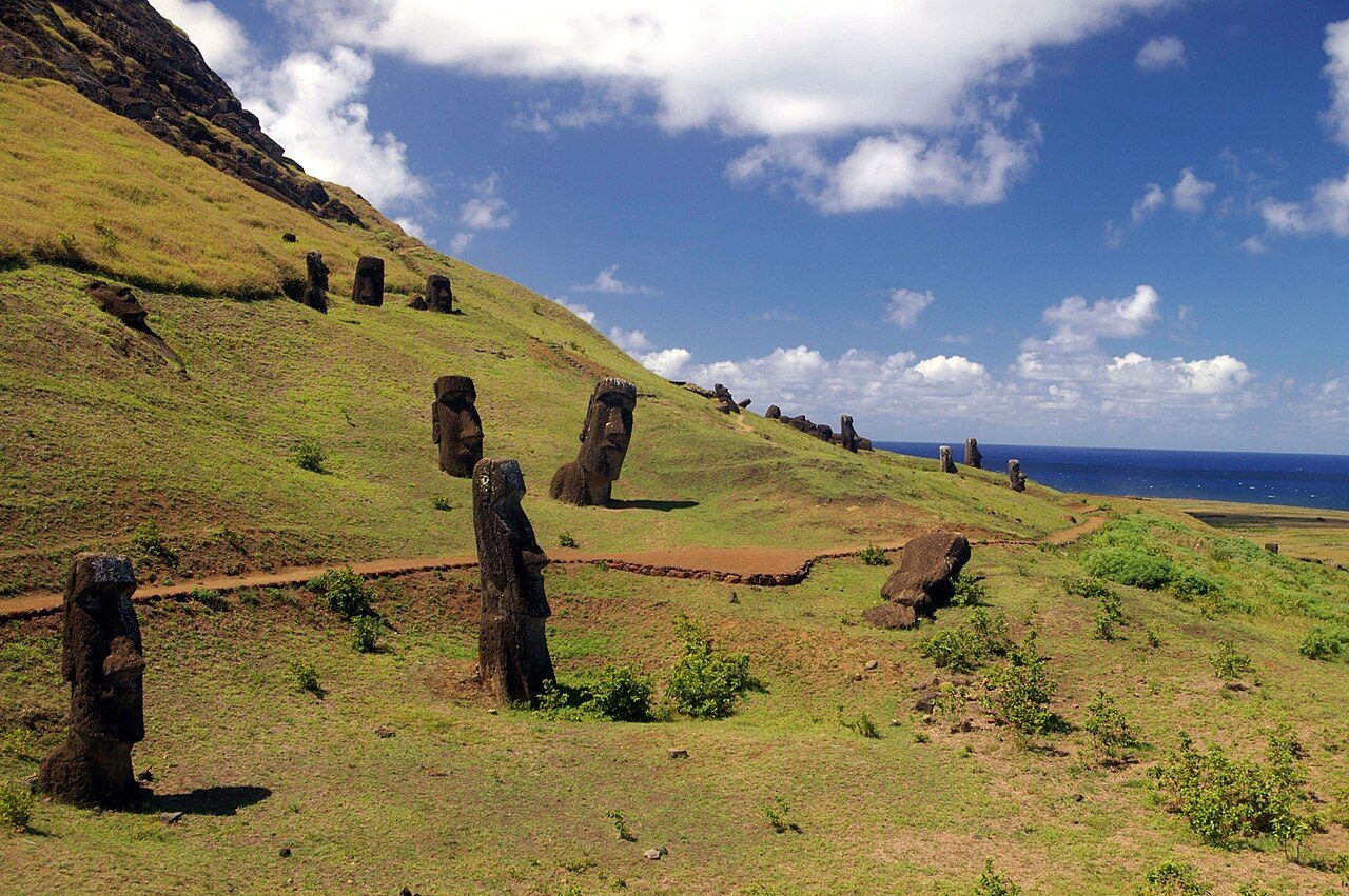 Outer slope of the Rano Raraku volcano, the main quarry area of the moai with many uncompleted statues. Moai Hinariru in the centre.